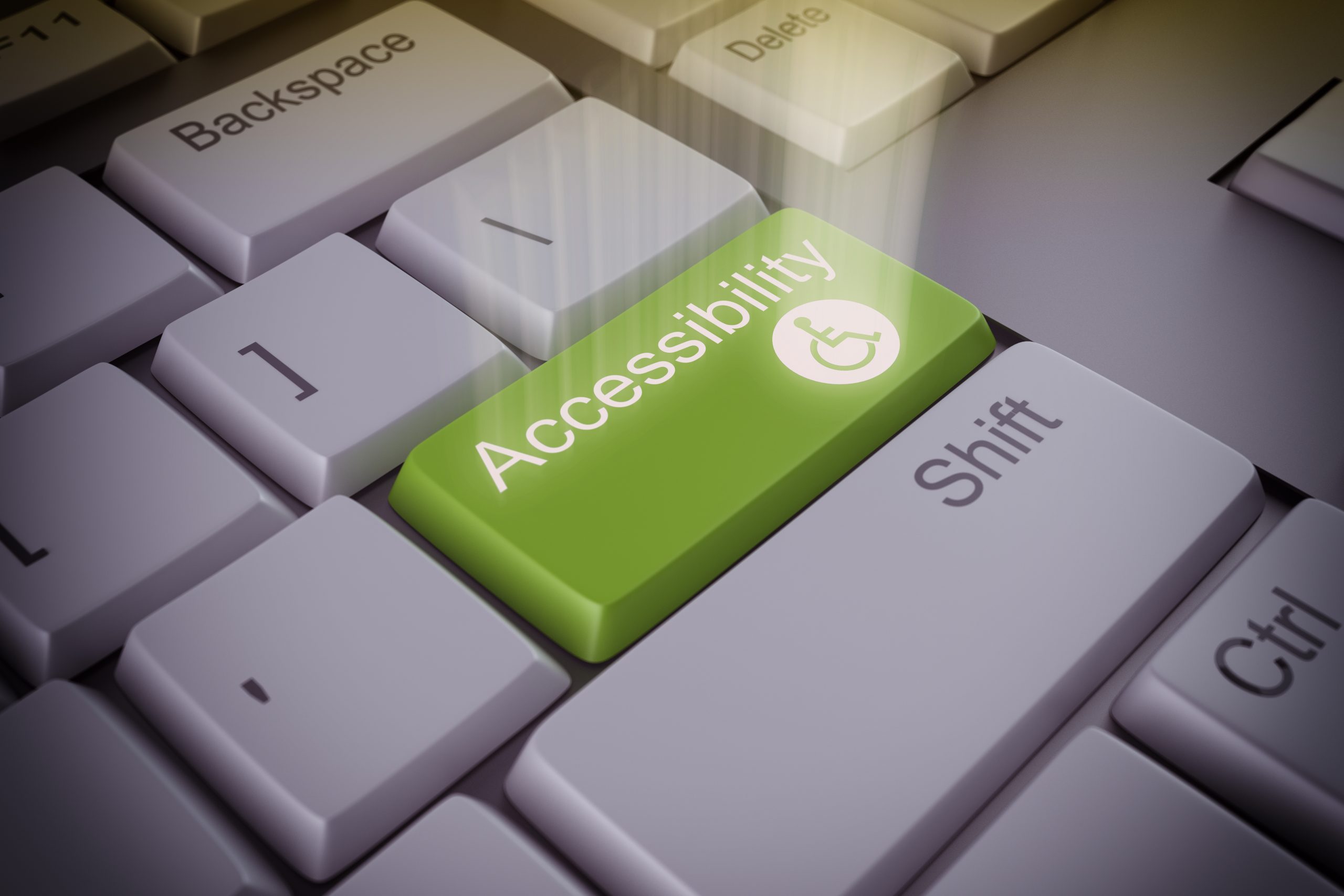 keyboard with a green accessibility key Computer keyboard with a green accessibility key