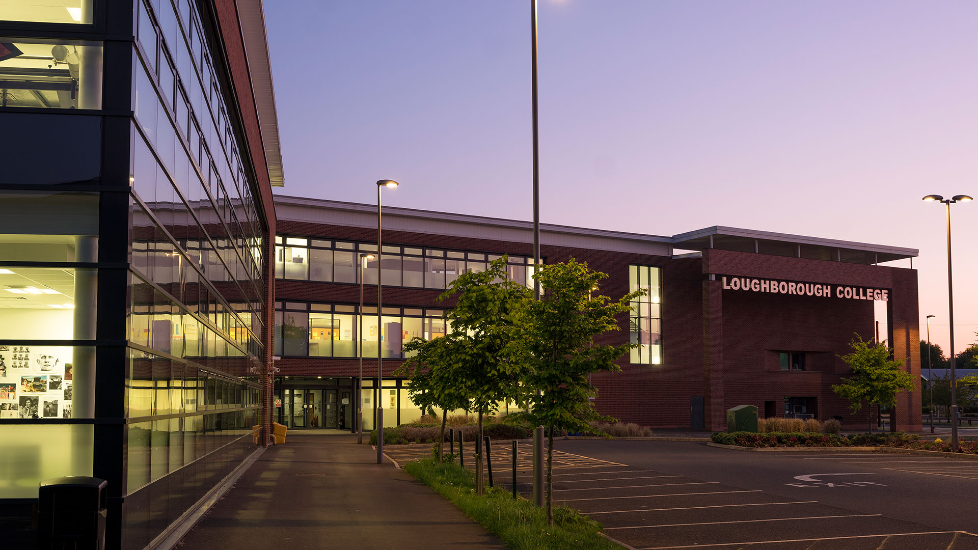 The front of the college building showing hub entrance and side of arts academy