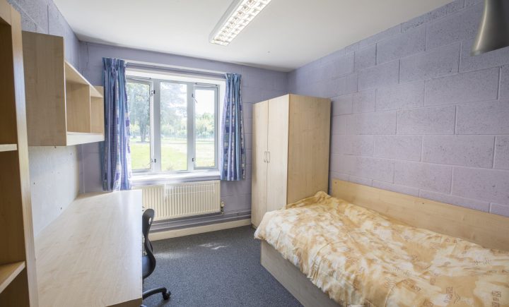 Loughborough College Halls of residence Room example - bed, window, wardrobe, cupboards